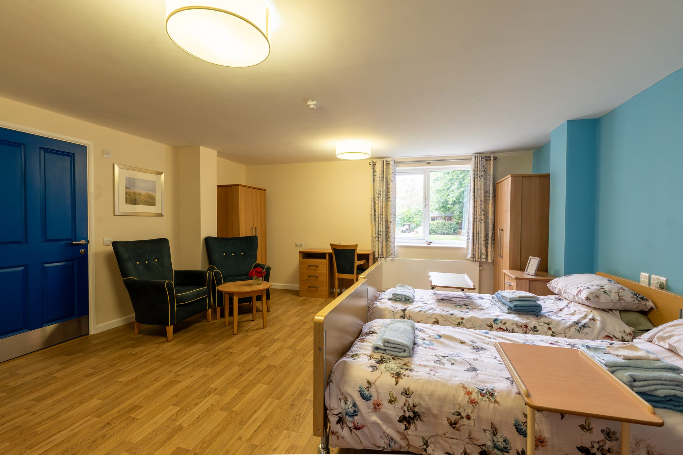 A bedroom at California House for people staying during rehabilitation